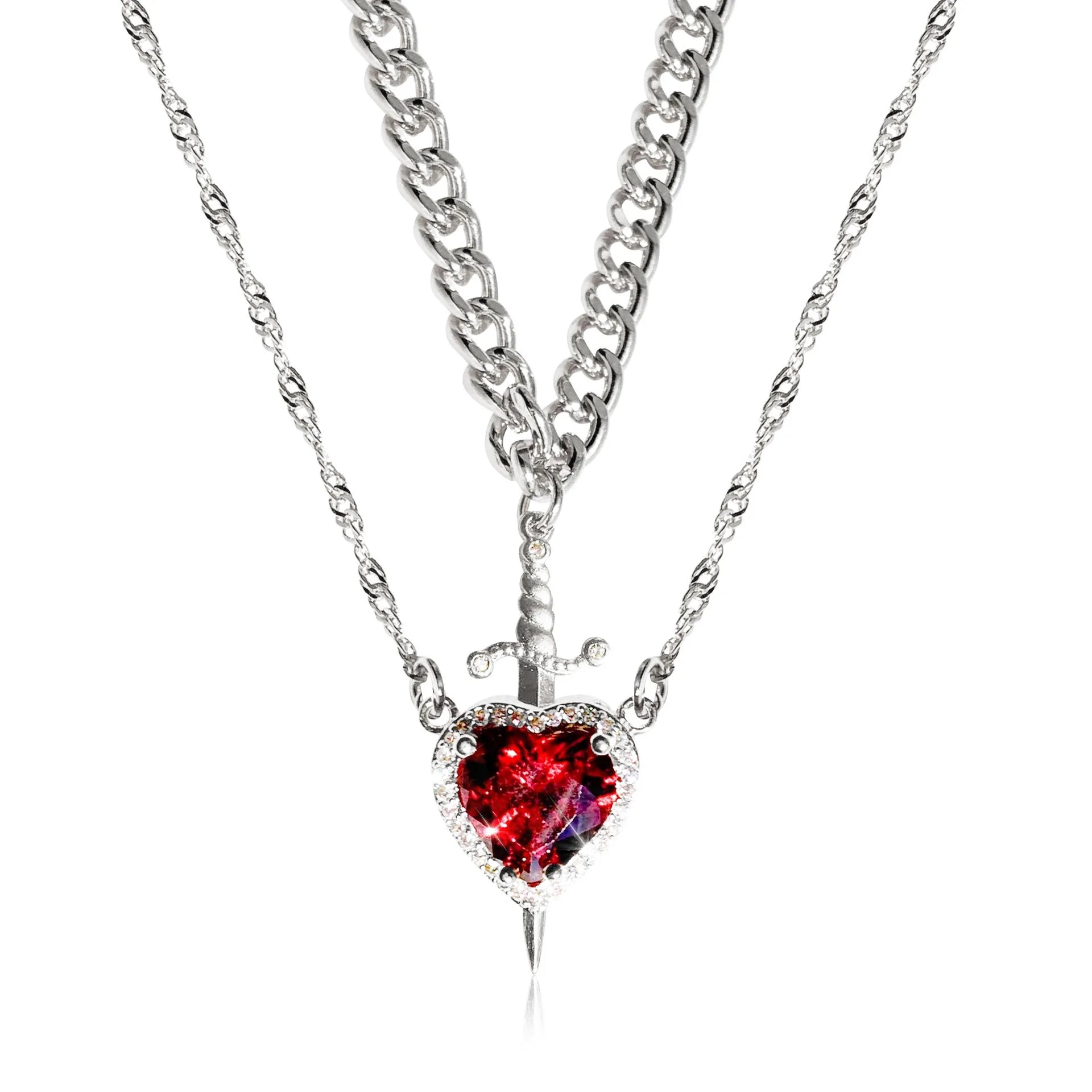 Silver necklace with a red heart-shaped pendant on a white background